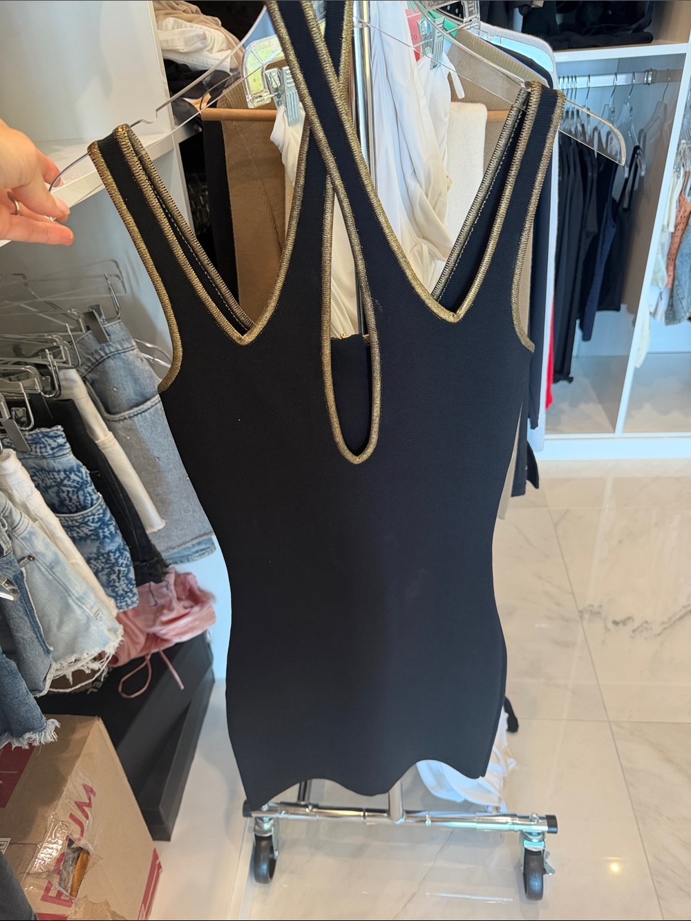 Black BALMAIN dress with Gold Trim. Criss cross neck.